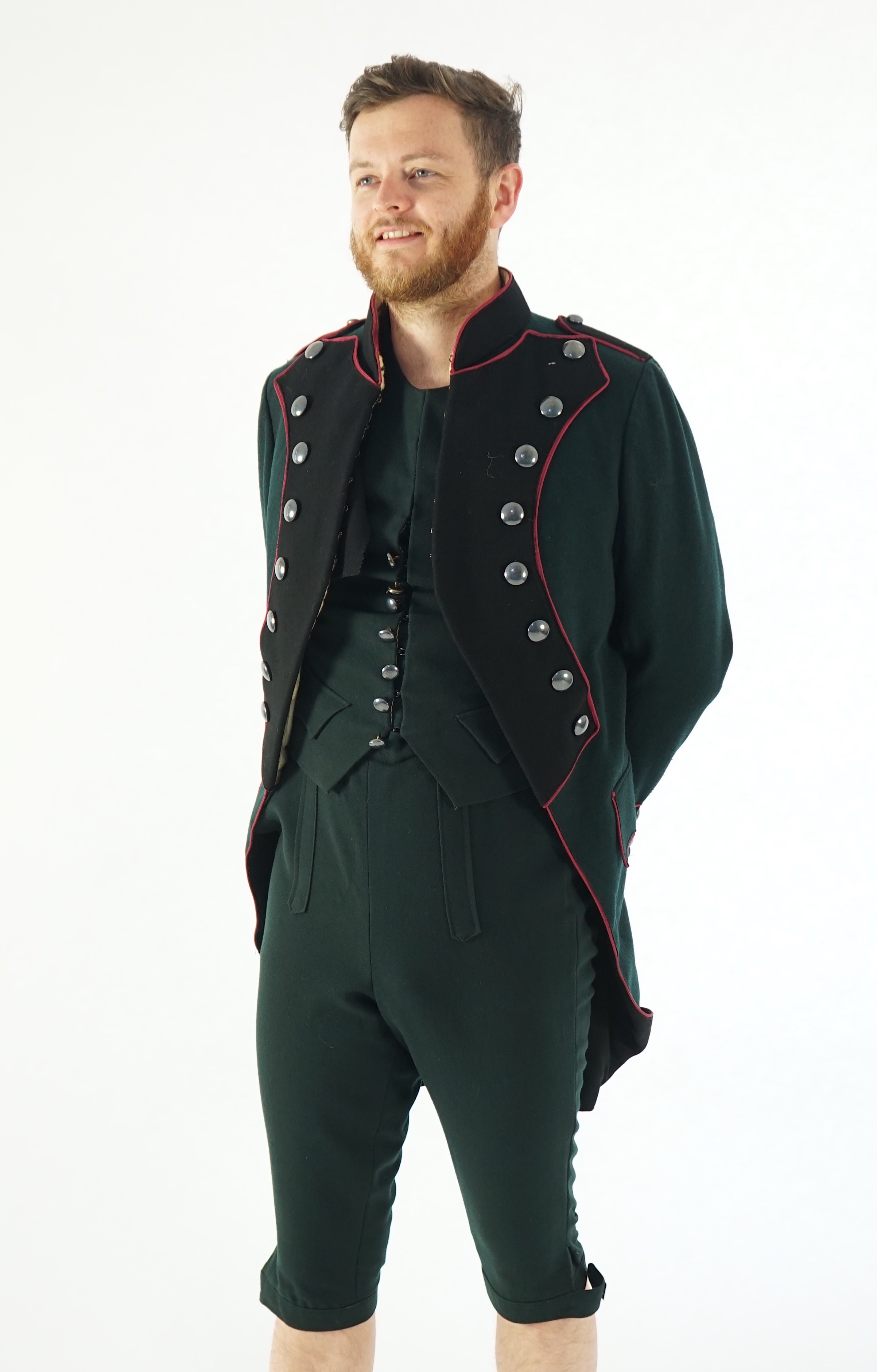 A dark green and black 18th Century style military uniform (jacket, waistcoat and breeches). Ex Royal Opera House - Soldier 'The Barber of Seville' 1993